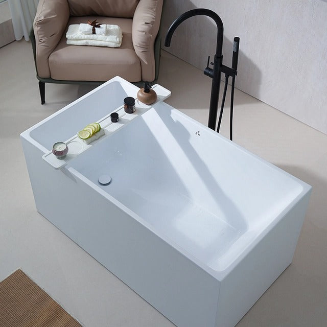 MonBlari white deep soaking bathtub in side top view with black floor-mounted faucet