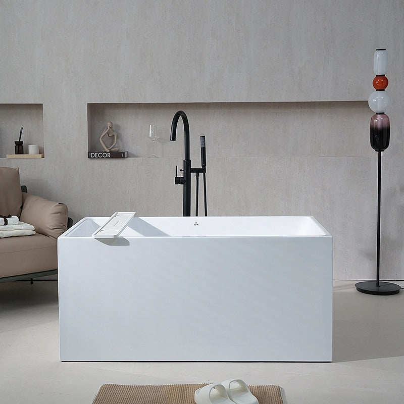 MonBlari white deep soaking bathtub in side view with black floor-mounted faucet