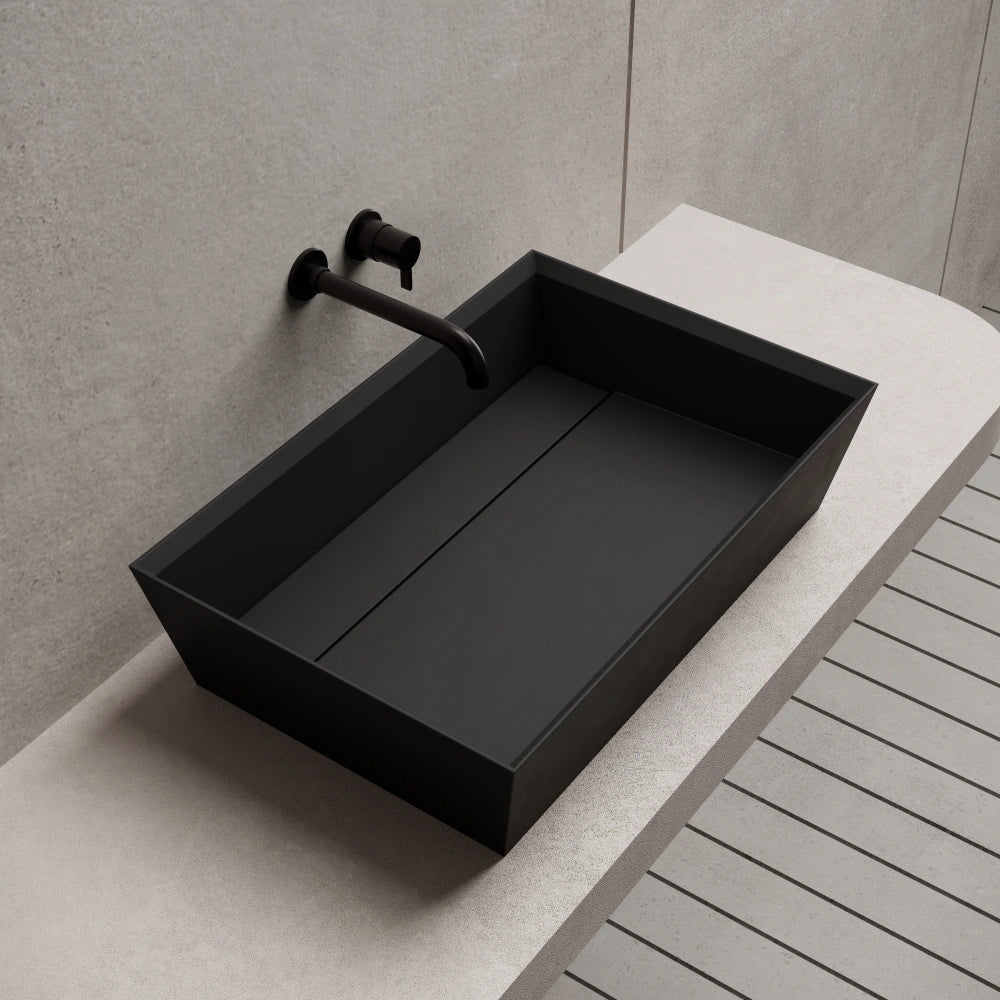 Black rectangular solid surface countertop sink vessel sink side top view