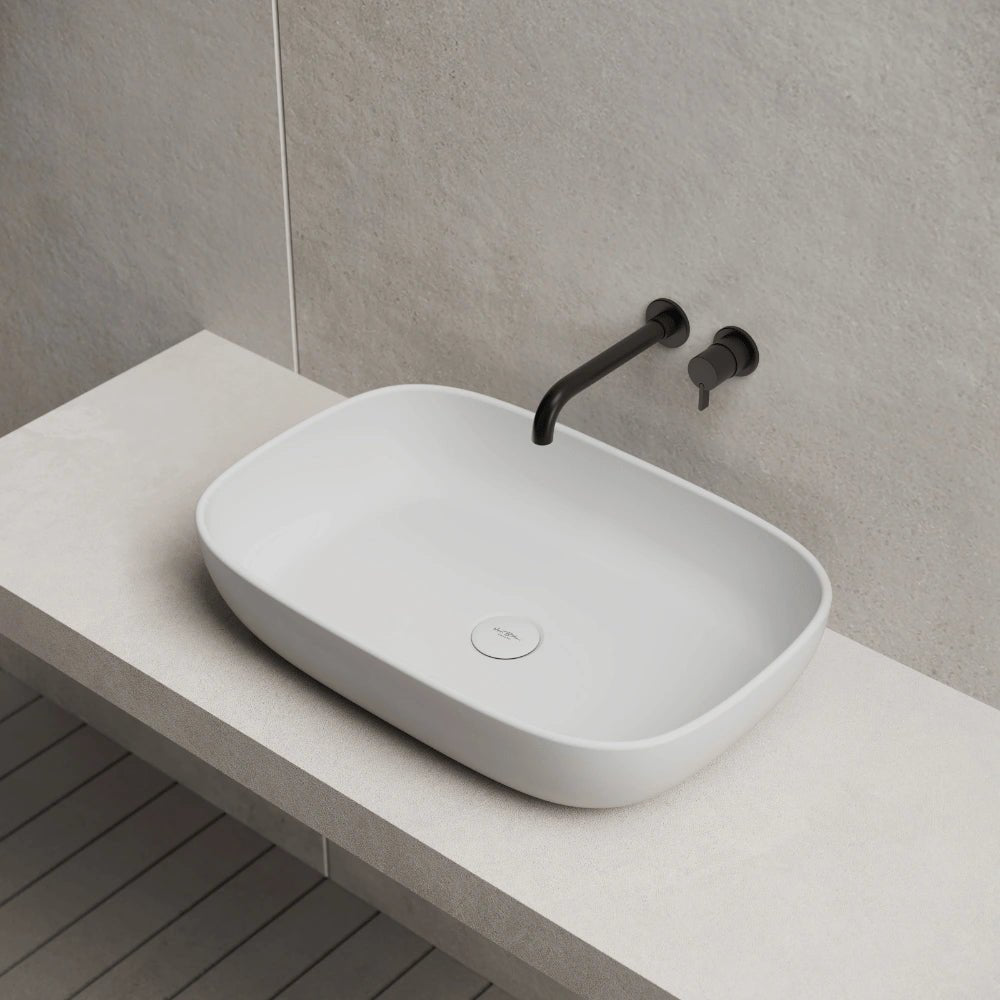White solid surface bathroom wash basin side top view