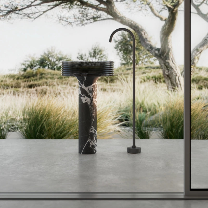 MonBlari black marble pedestal sink with clear acrylic