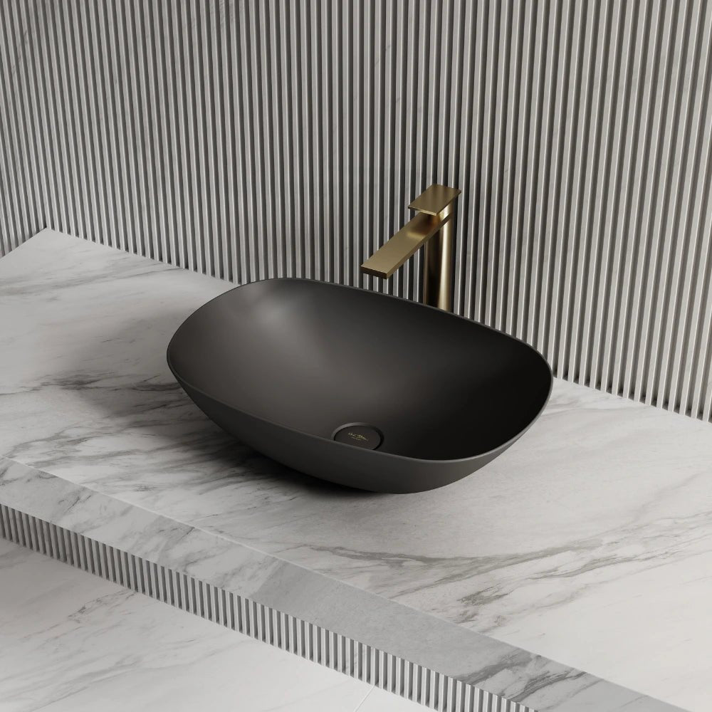Black oval solid surface bathroom vessel sink