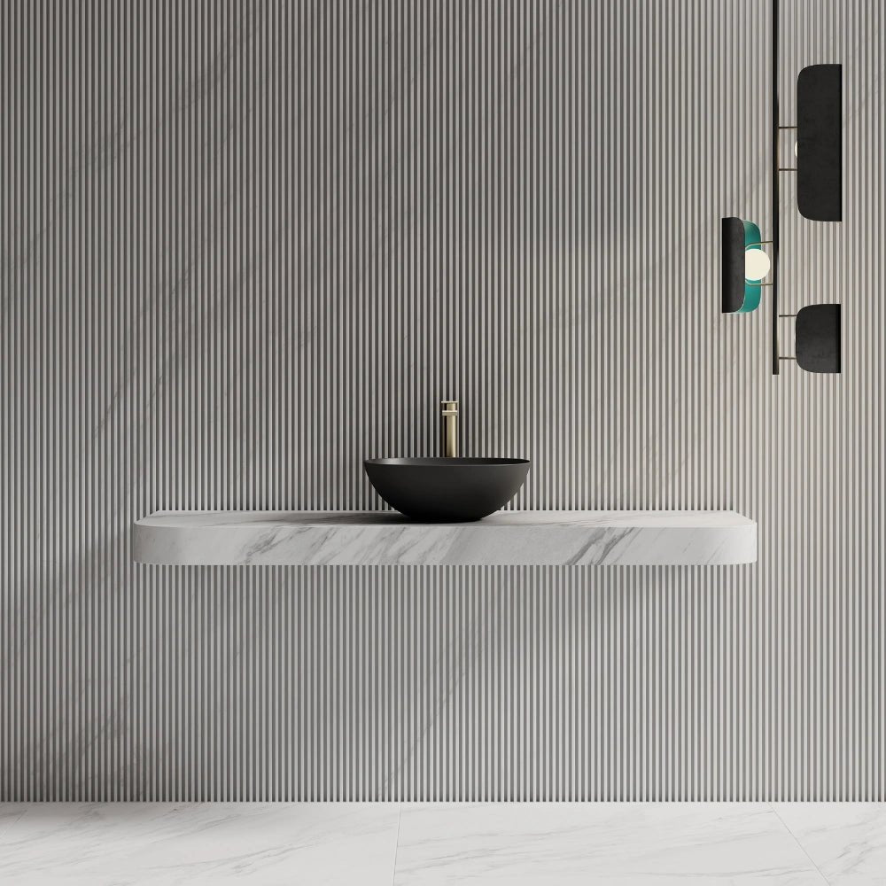 Elegant black oval bathroom sink designed as above countertop wash basin