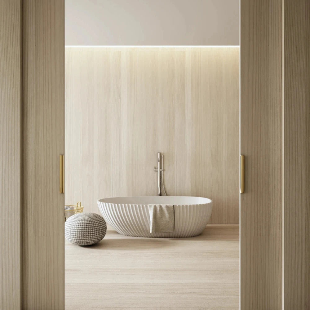 white solid surface bathtub with sculpted exterior lines