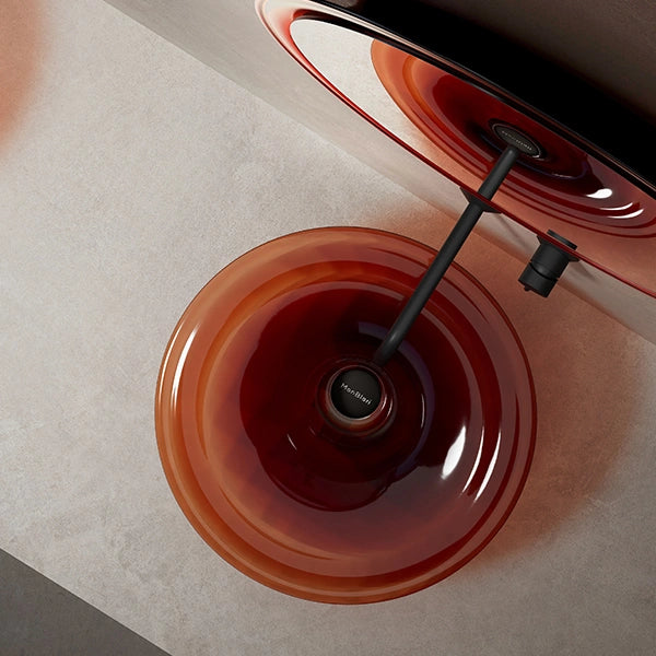 Elegant designer bathroom vessel sink with organic curved silhouette