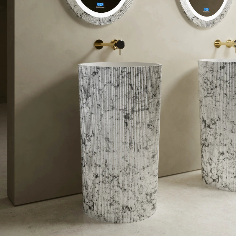 Sculptural freestanding bathroom sink with fluted solid surface design