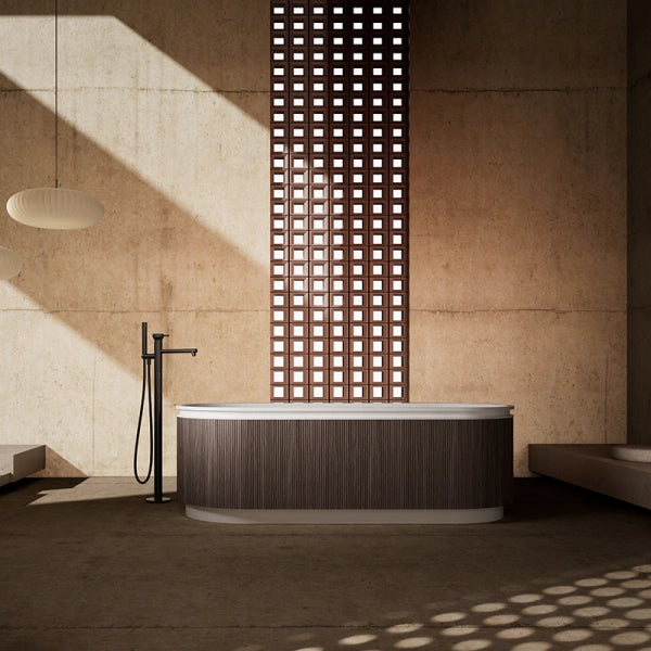 FOREST Series fluted solid surface freestanding bathtub in a luxury bathroom