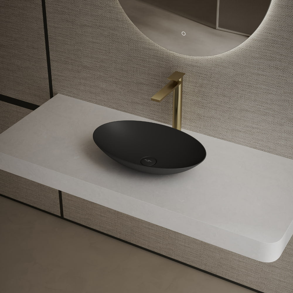 Matte black oval bathroom vessel sink side top view close-up