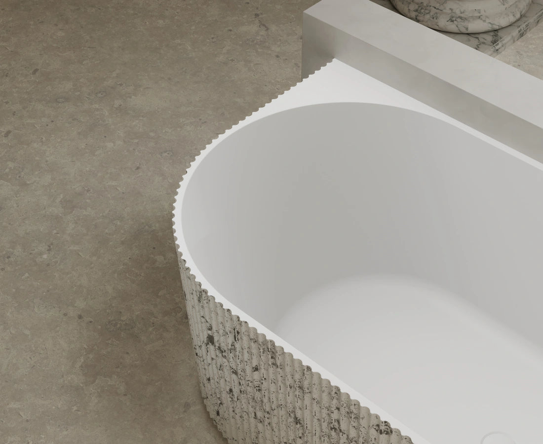 Contemporary 67 inch fluted soaking bathtub with center drain and matte white finish