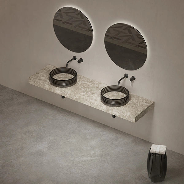 Modern bathroom basin with textured marble-inspired surface