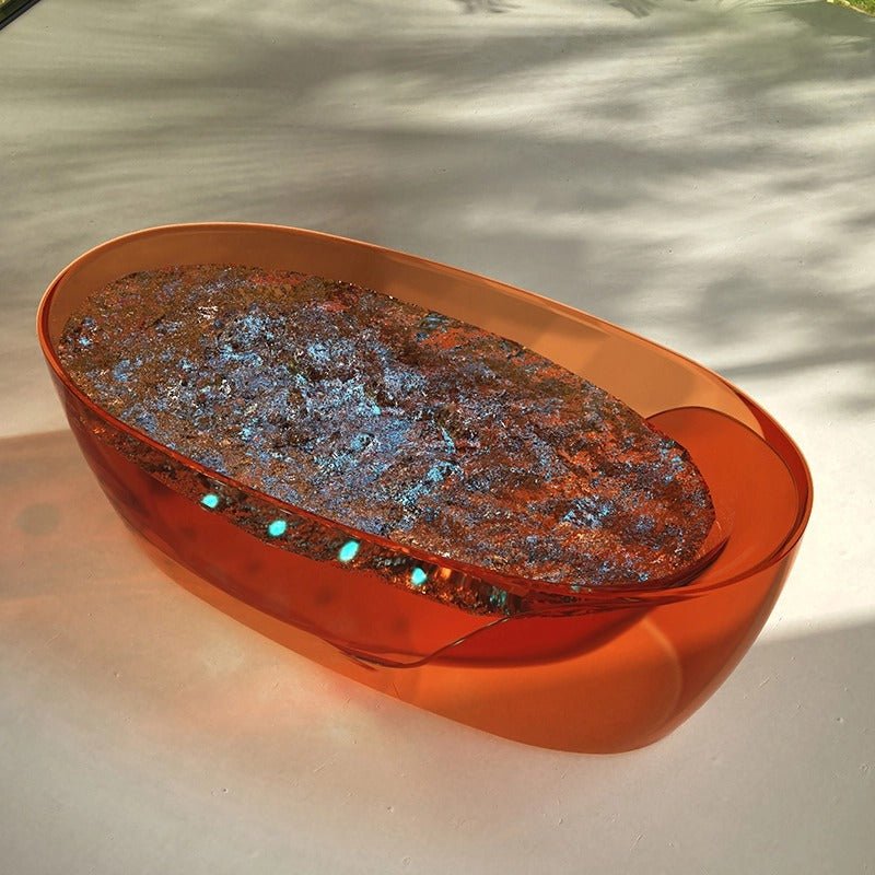 red resin bathtub with bubble feature and modern style