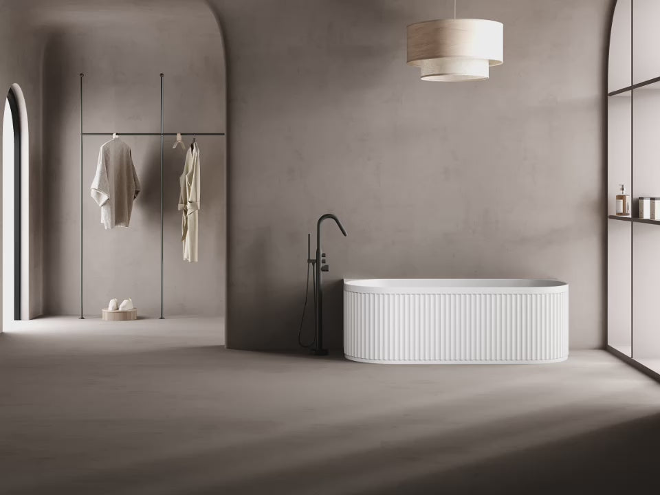Load video: Monblari Oval Solid Surface Freestanding Bathtub with Fluted Design