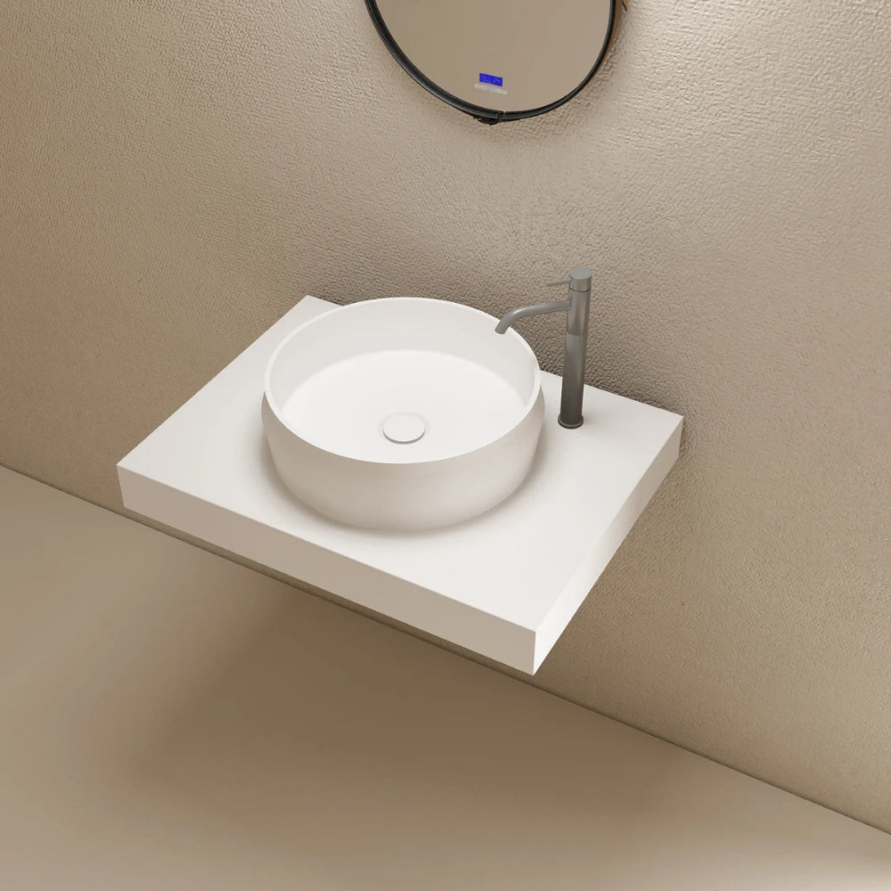 Modern white countertop basin with round shape for elegant bathroom