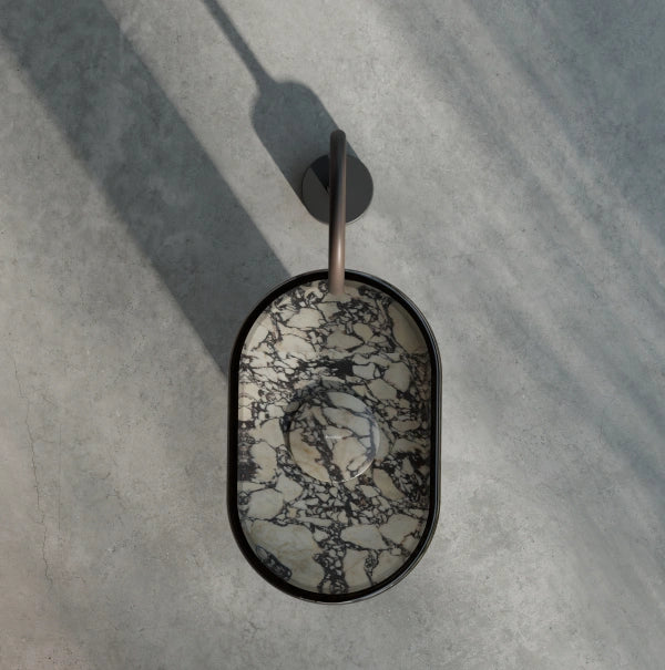 Layered marble pedestal basin with clear acrylic overlay