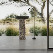 STRATA Series layered marble pedestal bathroom sink with acrylic overlay