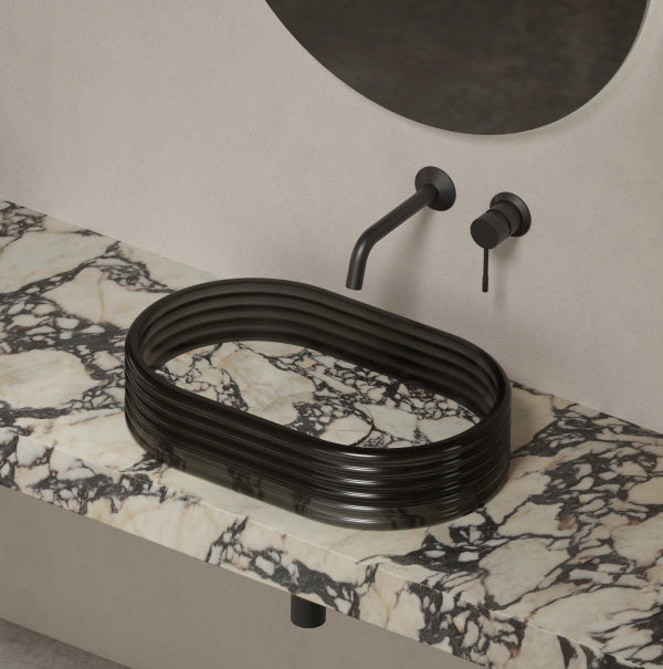 STRATA marble-inspired vessel sink with clear acrylic