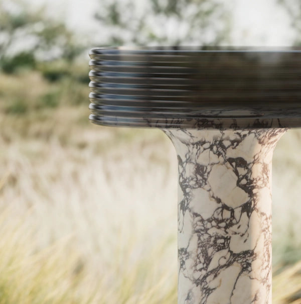 Natural marble pedestal bathroom sink with transparent layered detail