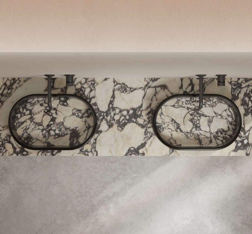 Luxury countertop vessel sink with marble-inspired finish
